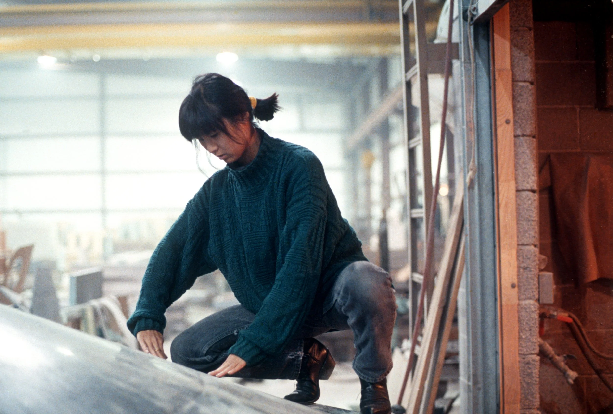 Maya Lin examining stone for Civil Rights Memorial — shot on assignment for The New York Times Magazine