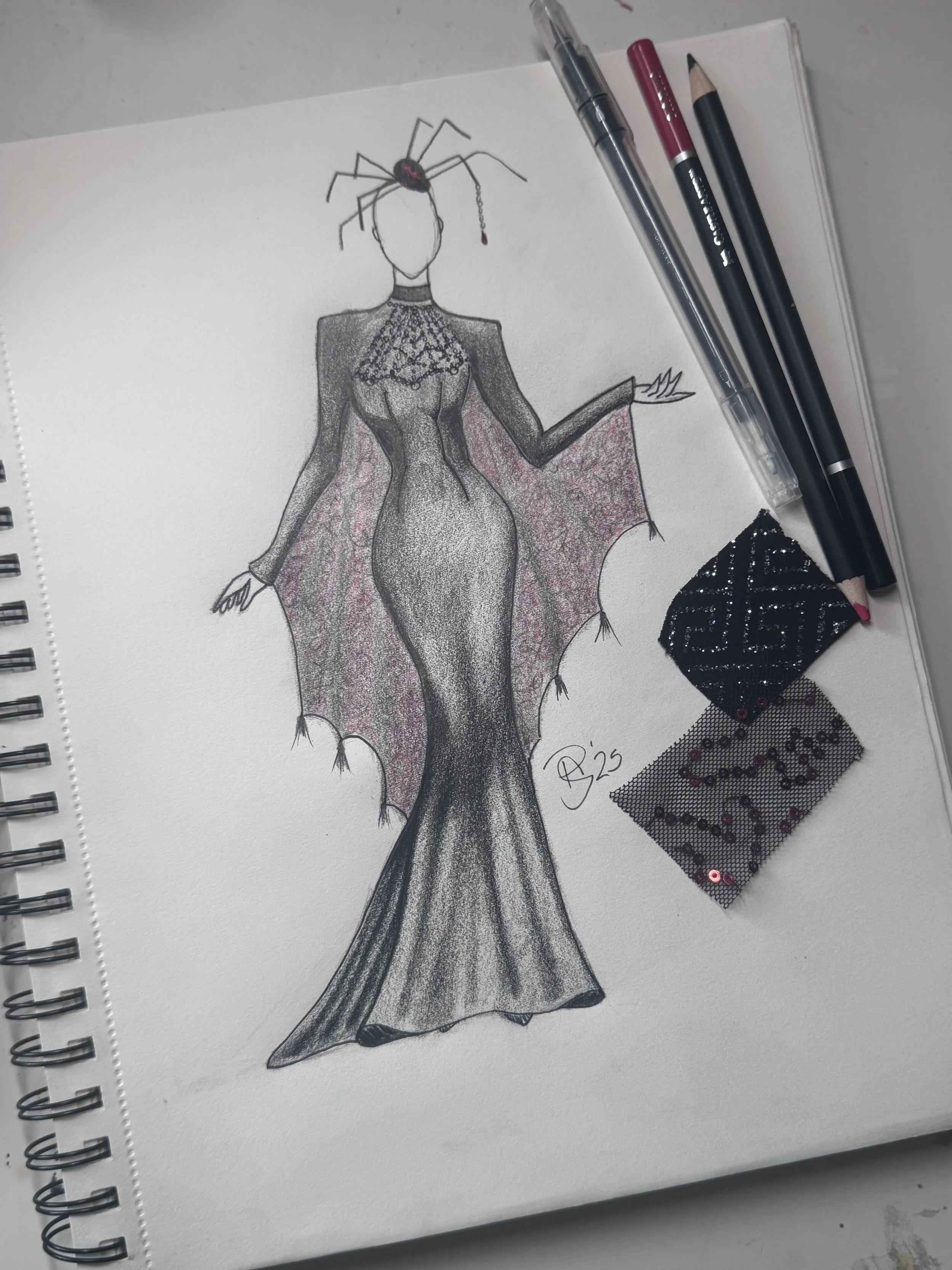 Fashion design sketch of feminine figure wearing a black form-fitting floor-length gown with long sleeves. figure drawing is also wearing a spider web inspired chain necklace and headpiece, with spider web style sleeve embellishments and tassels.