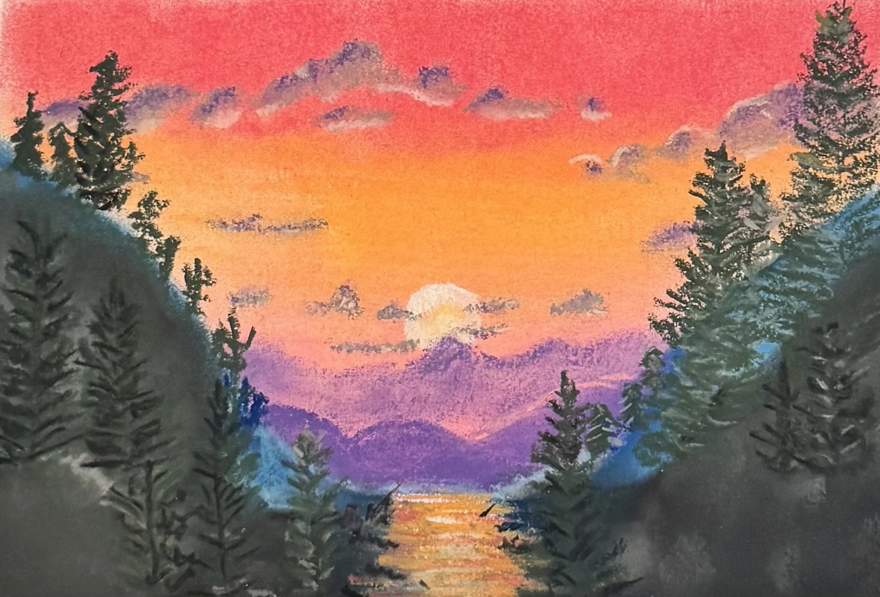Pink Sunset Over Mountains. Pink and orange and purple competing for the same square inch of sky. Mountains witnessing. The day refusing to leave quietly.