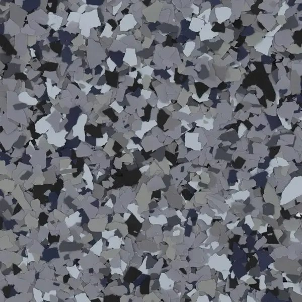 Close-up view of gray, black, and white speckled epoxy floor flakes.