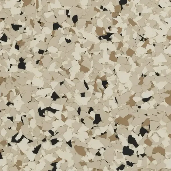 Close-up of beige, black, and gray speckled textured surface.