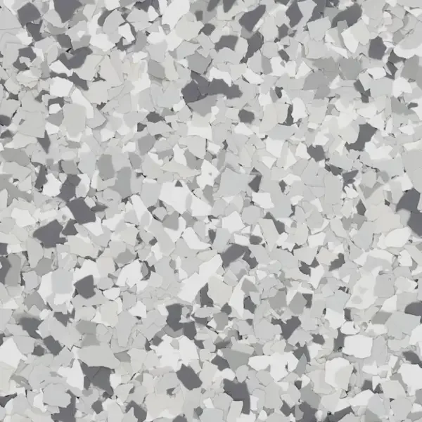 Close-up of speckled gray and white terrazzo epoxy floor flakes.