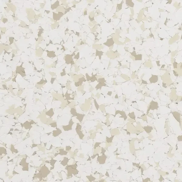 Close-up of a textured surface with a speckled pattern of off-white, beige, and cream-colored flakes.