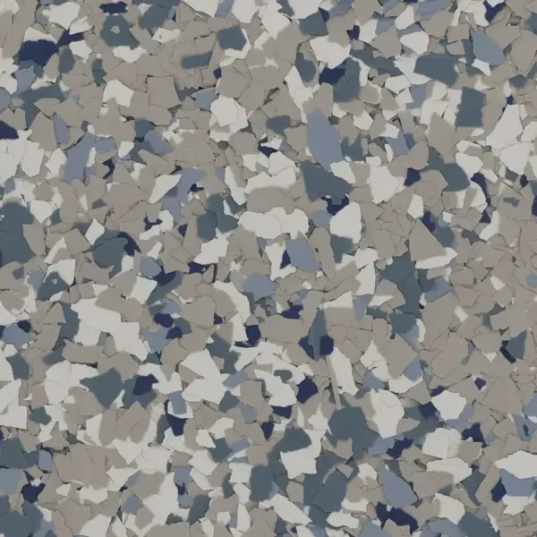 Close-up of multicolored, irregularly shaped gravel or small stones in shades of gray, white, and blue.