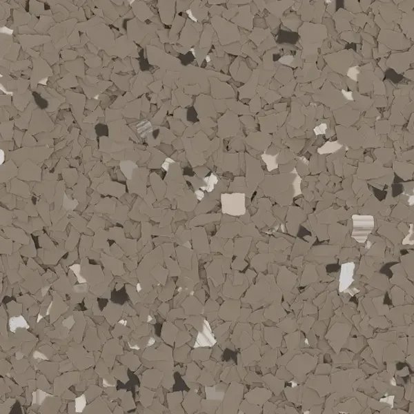 Close-up view of a textured surface composed of small, irregularly shaped, gray and white fragments resembling crushed stone or decorative terrazzo material.
