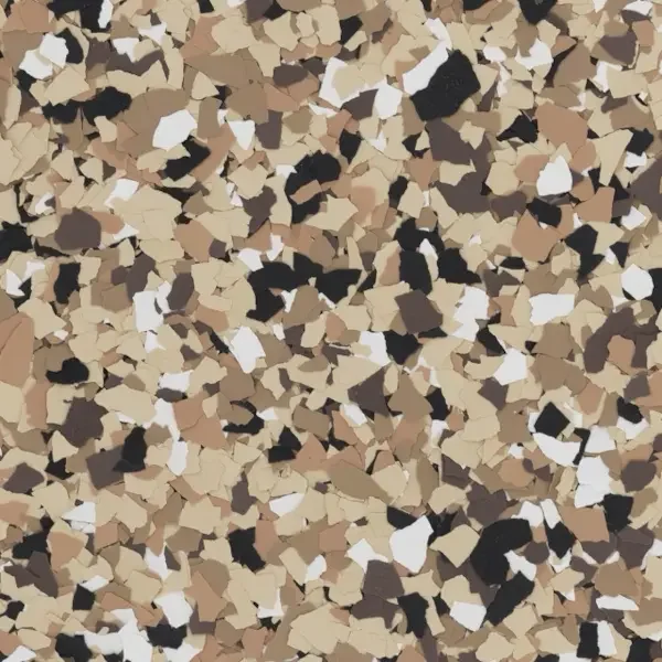 A close-up of multicolored gravel or small stone pieces in shades of beige, black, brown, and white
