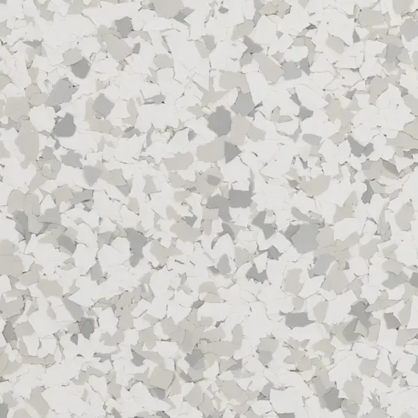 Close-up of a textured white surface with irregular cracks and flakes.