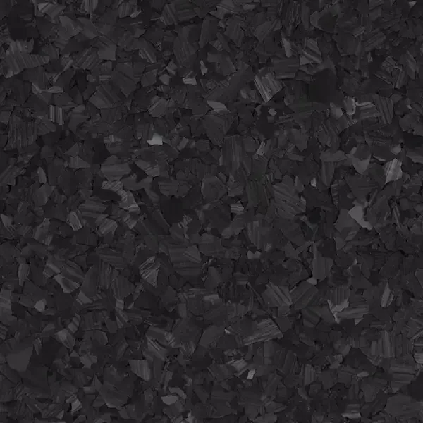 Close-up of black charcoal epoxy floor flakes.