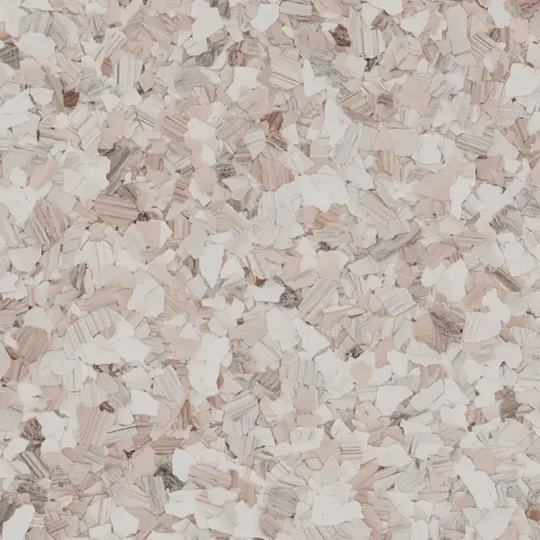 Close-up of wood shavings or chips in light beige and brown tones.