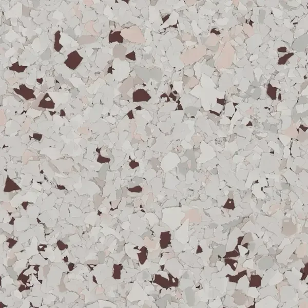 Close-up of a speckled surface with white, pink, and dark brown irregular patches.