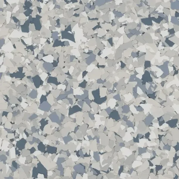 Close-up of gray and white terrazzo flooring with irregular epoxy floor flakes