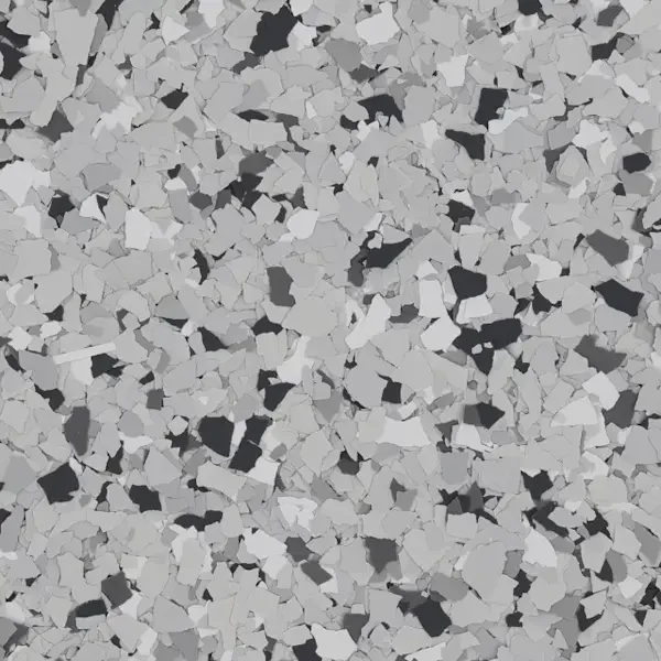 Close-up of speckled black, white, and gray terrazzo epoxy flooring surface.