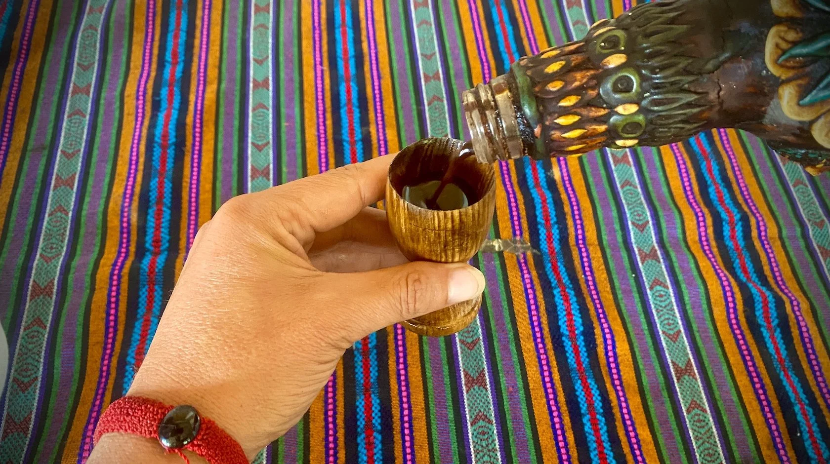 Traditional ayahuasca brew prepared for a guided healing ceremony at a veteran-led retreat focused on emotional reset and transformation