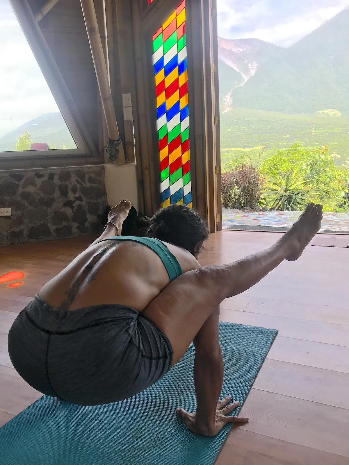 Woman practicing yoga meditation at a veteran-led wellness retreat focused on mental reset, stress relief, and holistic healing