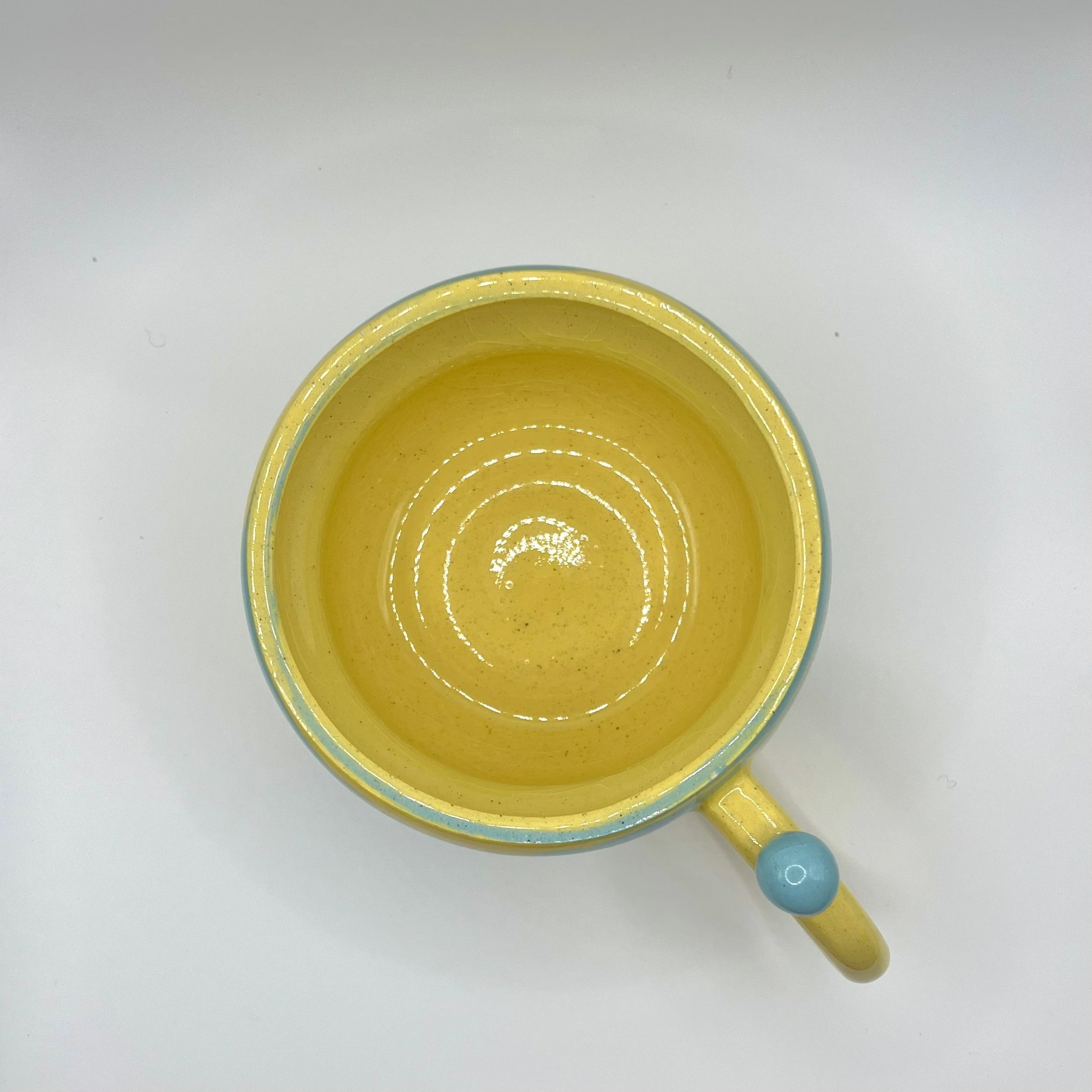 yellow blue mug inside.jpeg