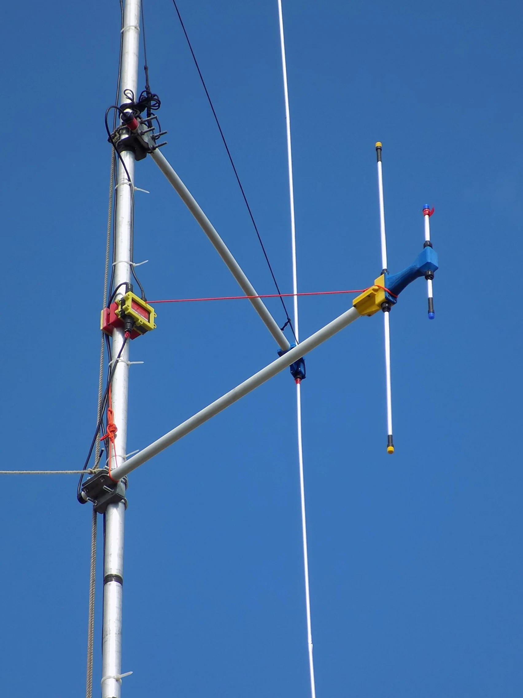 2 Marino Customs Dipole Antenna Kits deployed on a mast