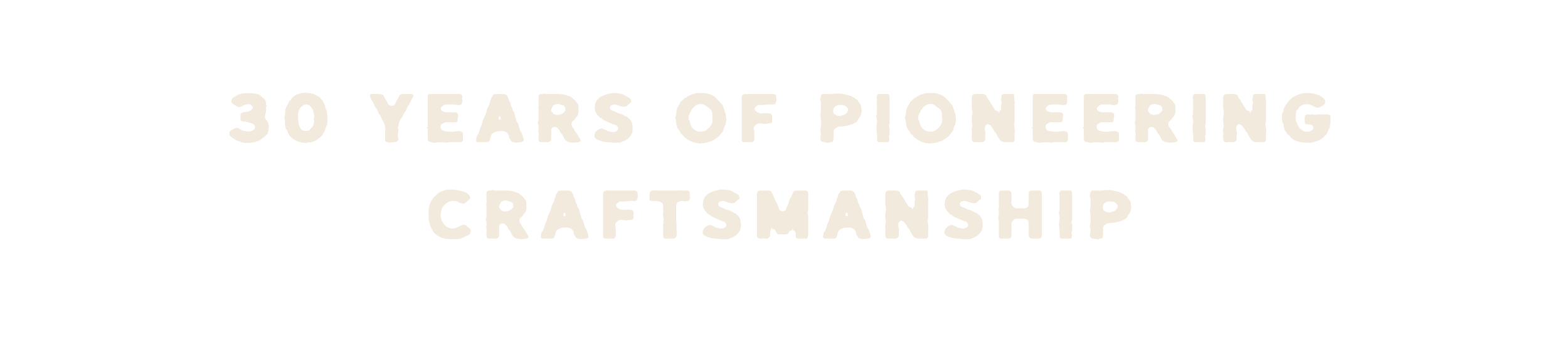 Text image reading '30 Years of Pioneering Craftsmanship' in white letters on a black background.