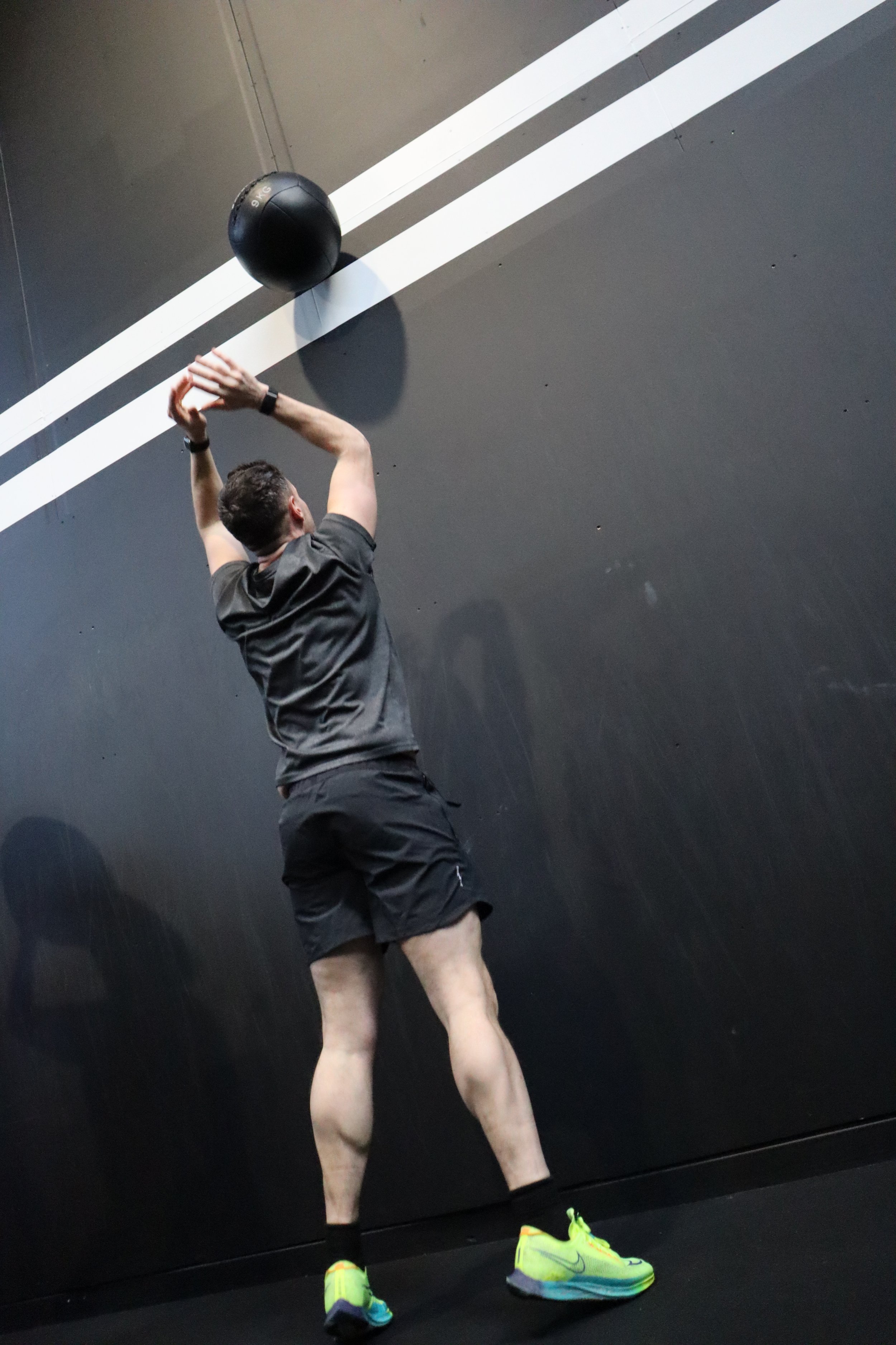Athlete catching a wall ball during a HYROX training session at Alliance Training Club Letterkenny