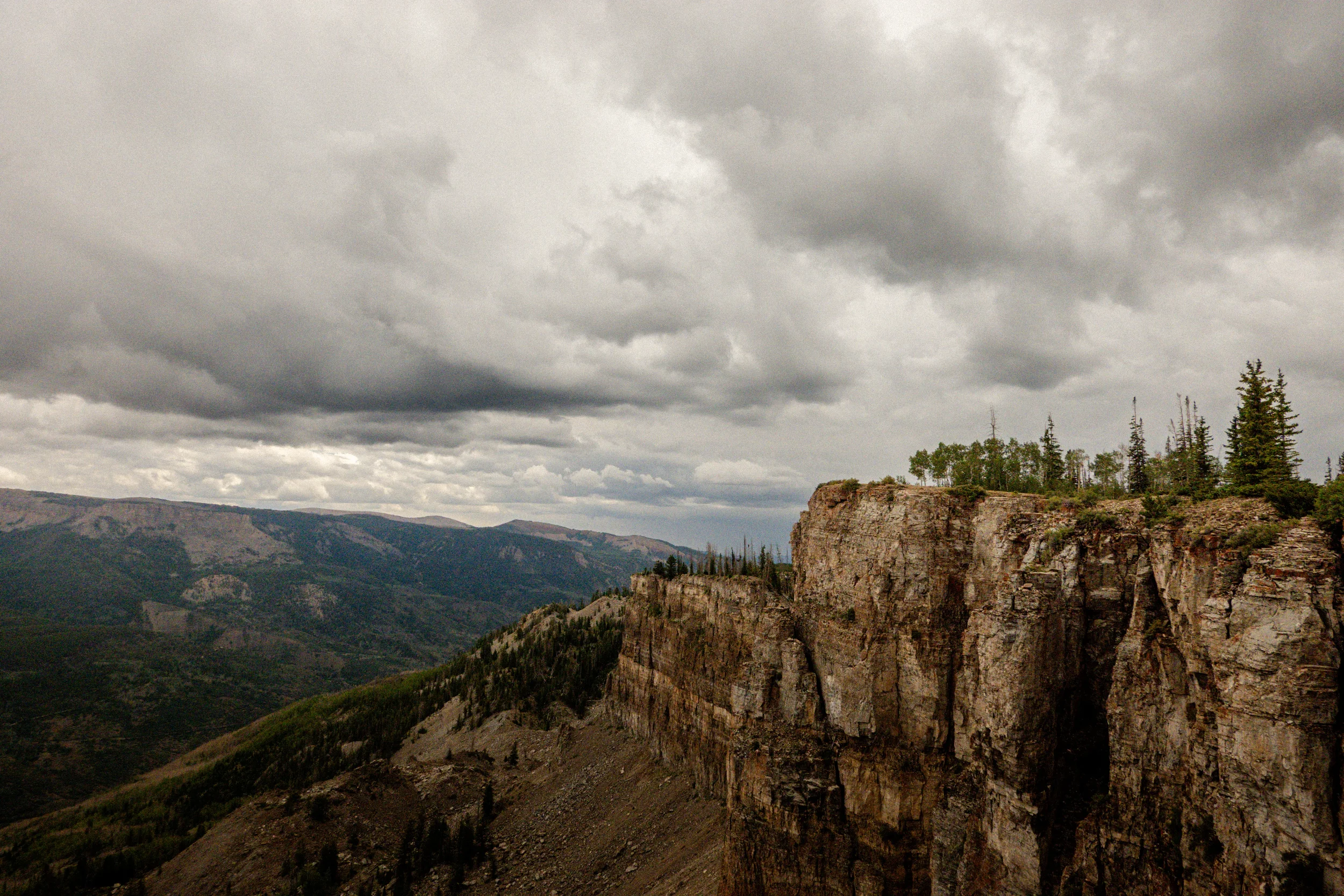 large cliff with a sheer drop off in the uintas