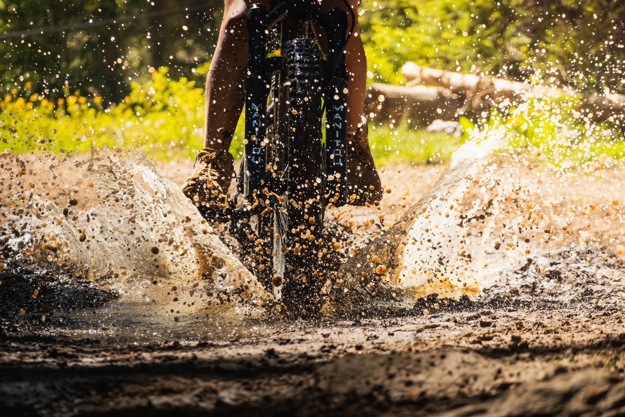 muddy splash from a bike in a puddle