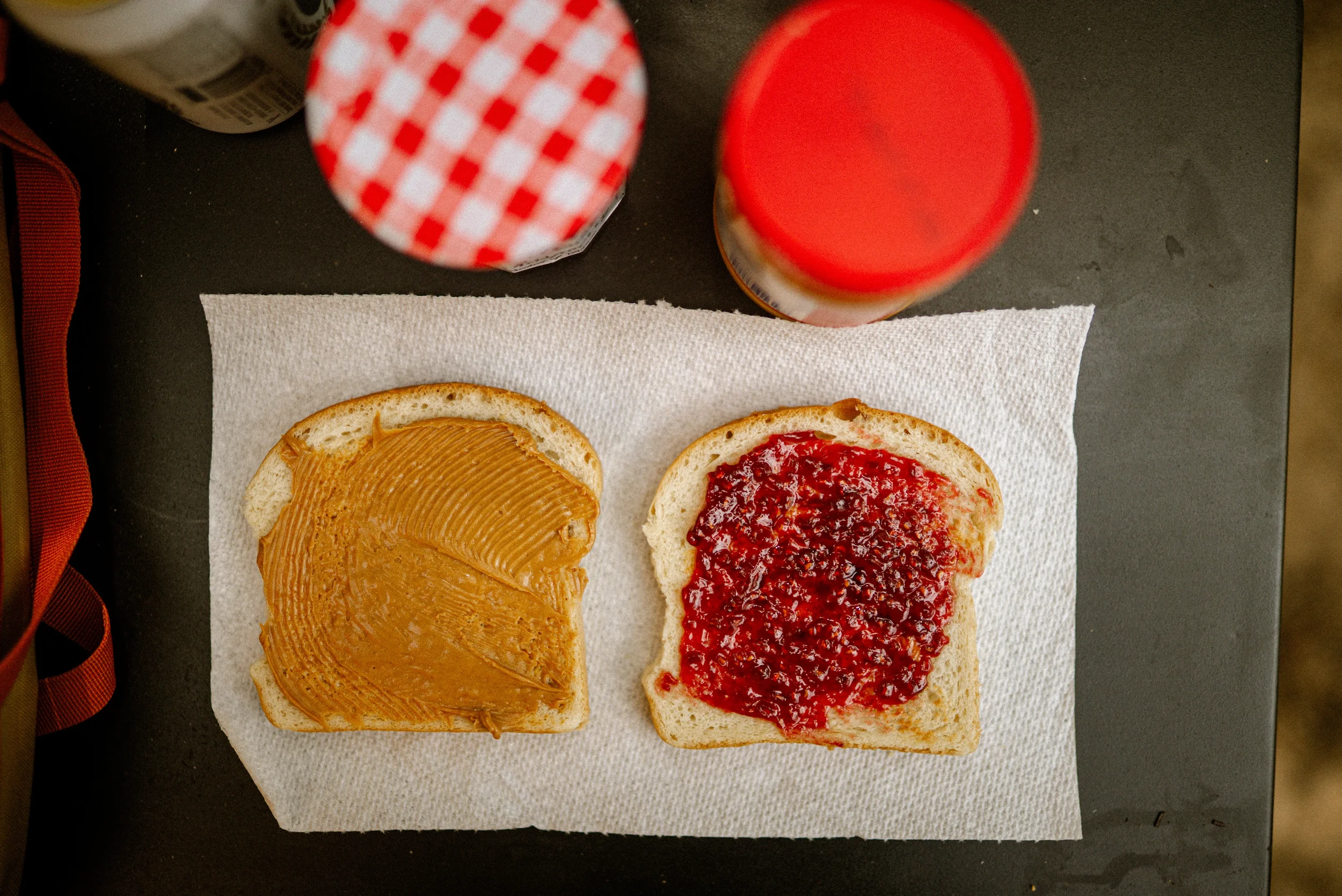 peanut butter and jelly sandwich on a camp table