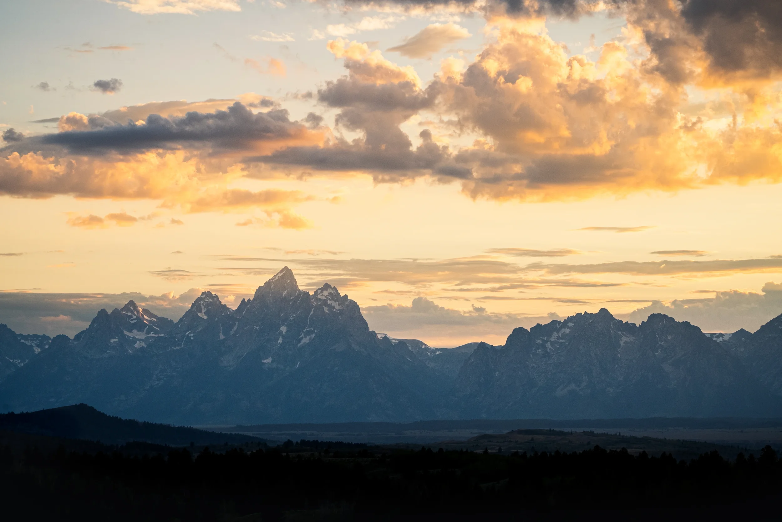 sunset over the grand teton national park