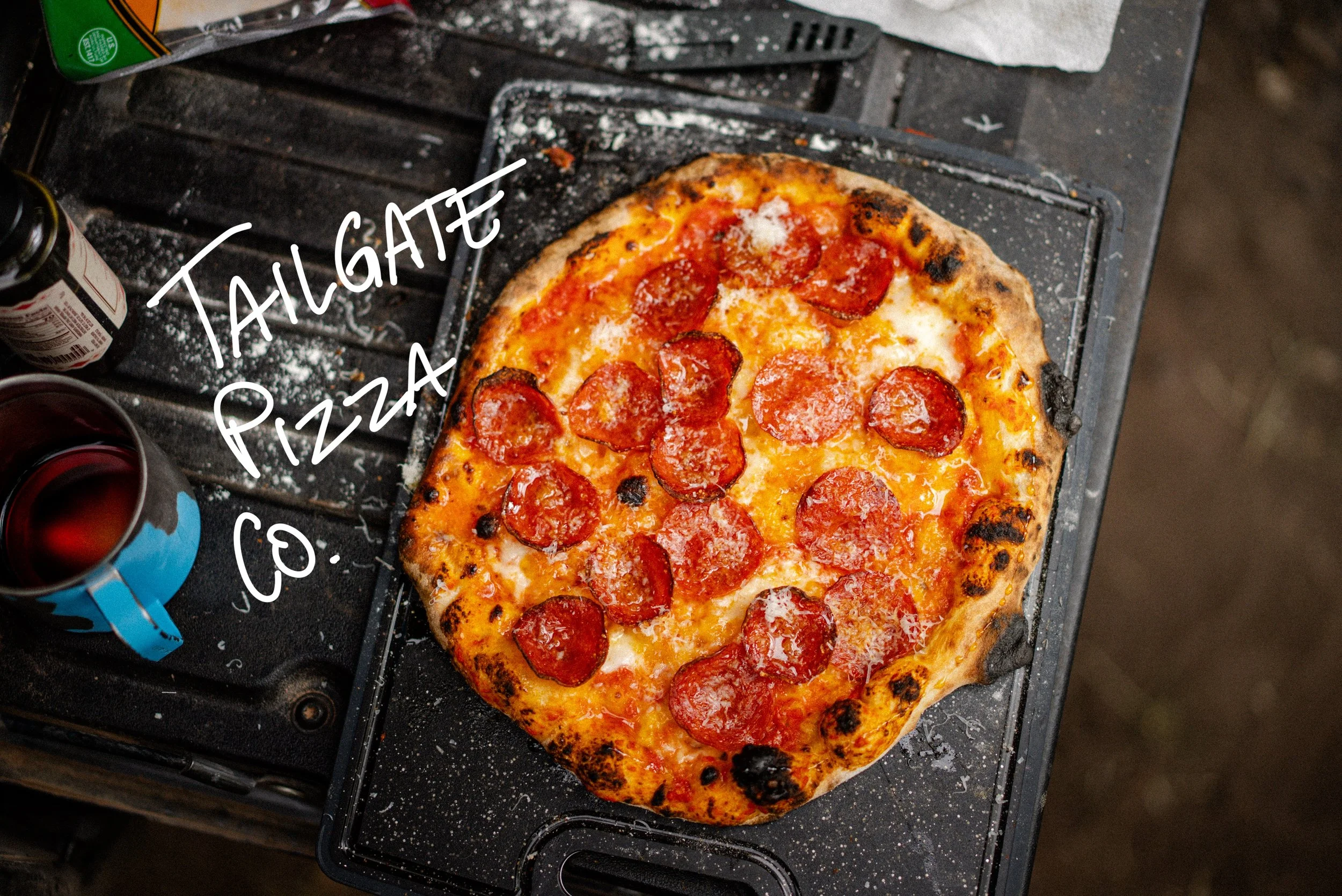 pepperoni pizza on a tailgate