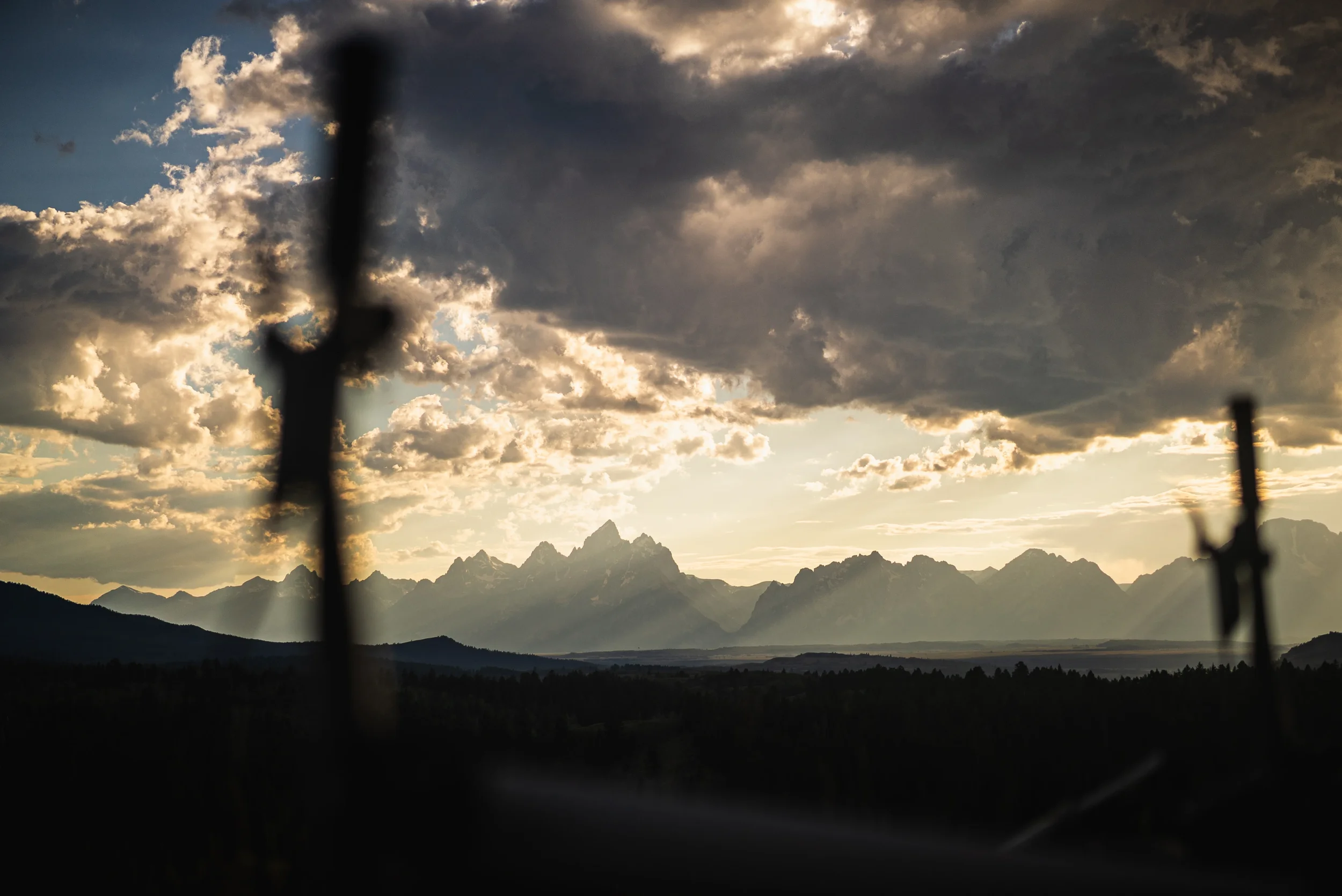 mountain bikes blurred out in front of teton range