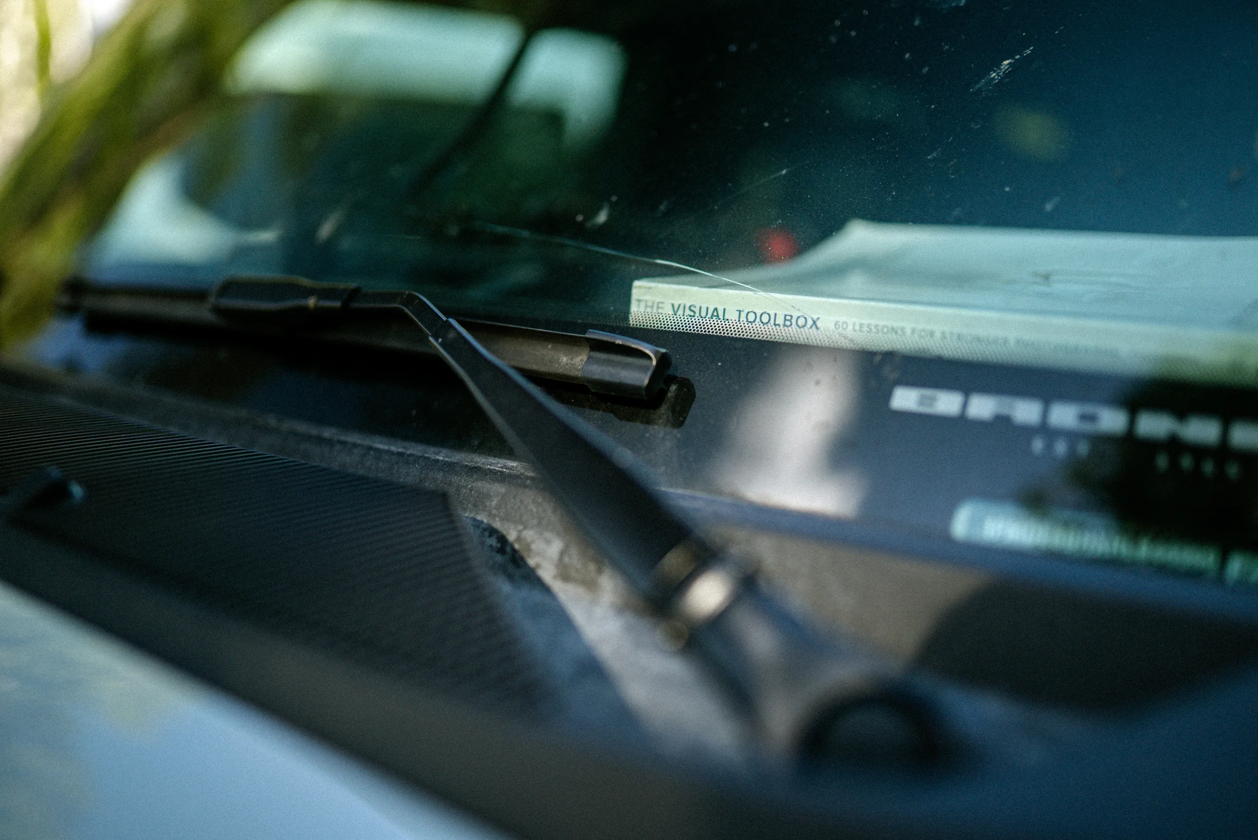 photography book on a bronco dashboard