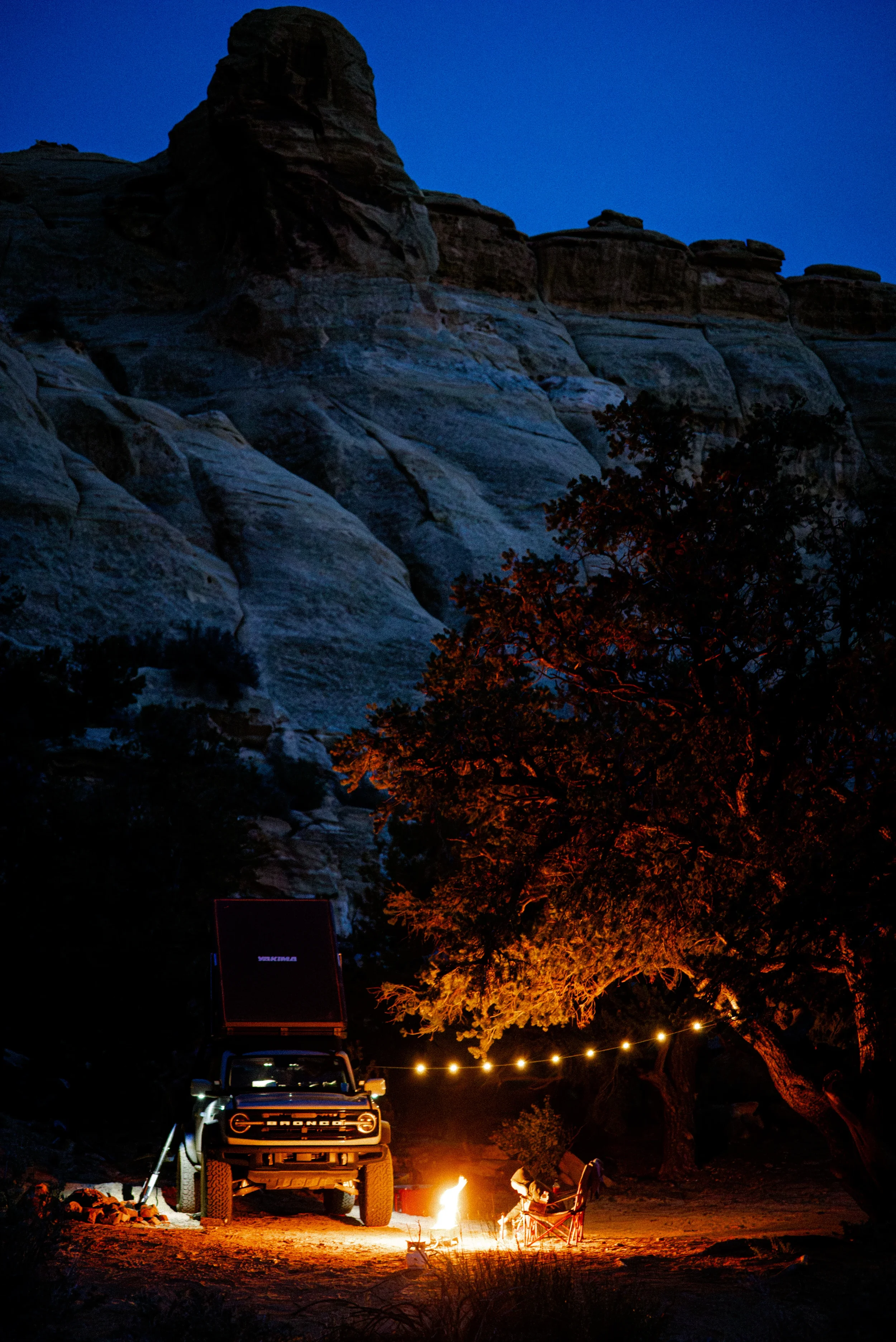 ford bronco camping overland with fire pit