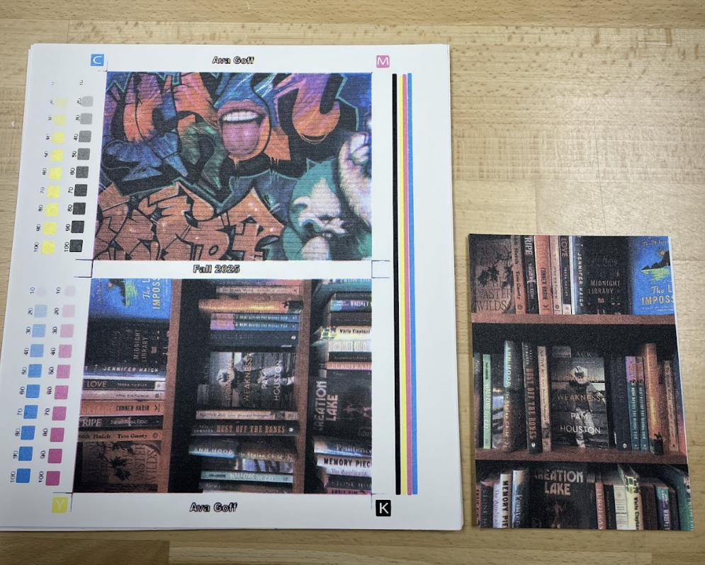 Color test chart with two sections, one featuring graffiti art and the other showcasing books, placed on a wooden surface.