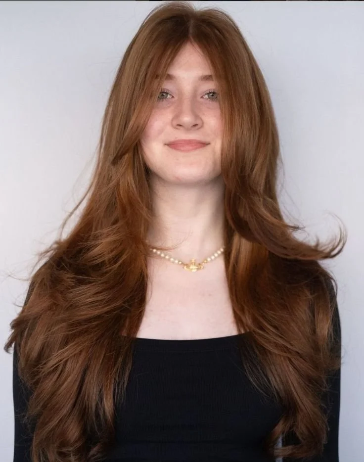 copper red hair color with soft dimension in exton pa salon