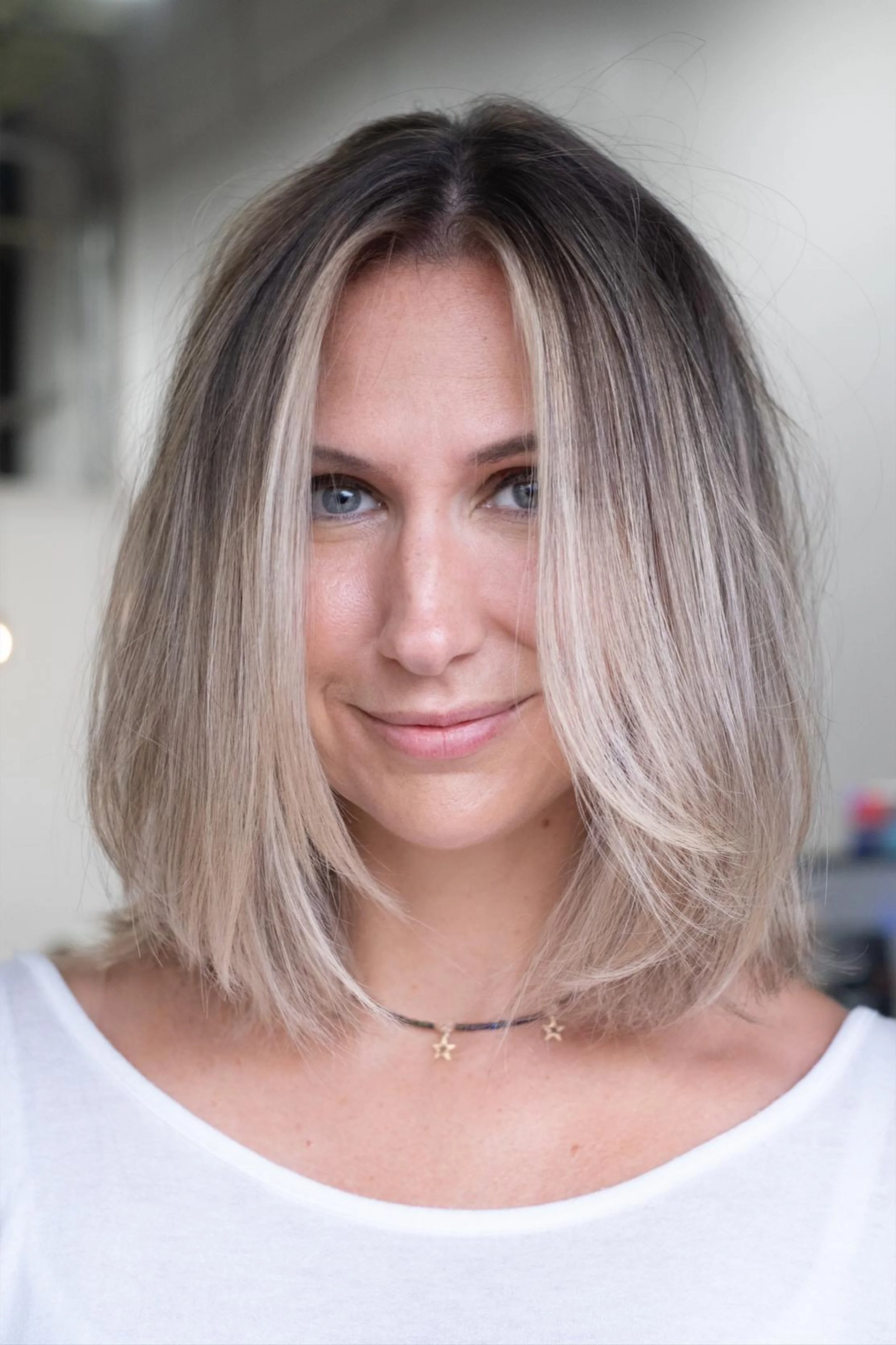 shoulder length blonde hair color with soft blend in exton pa salon