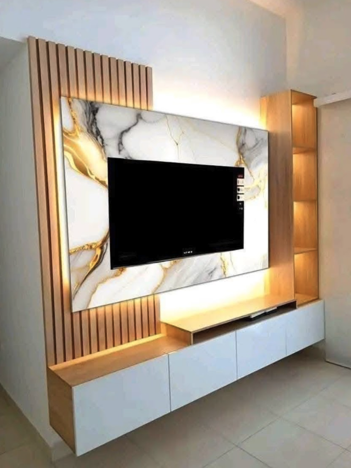 Modern living room entertainment wall with a flat-screen TV mounted on a marble and wood accent wall with built-in lighting and storage.