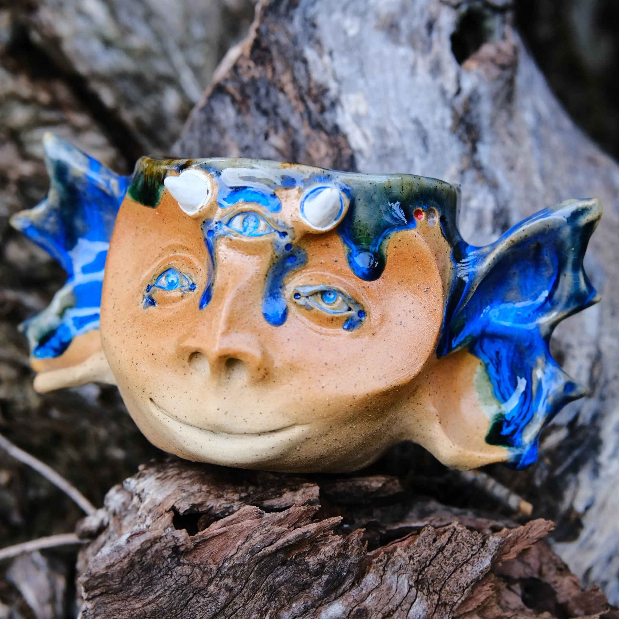 handmade ceramic faun face mug with horns and third eye australian pottery