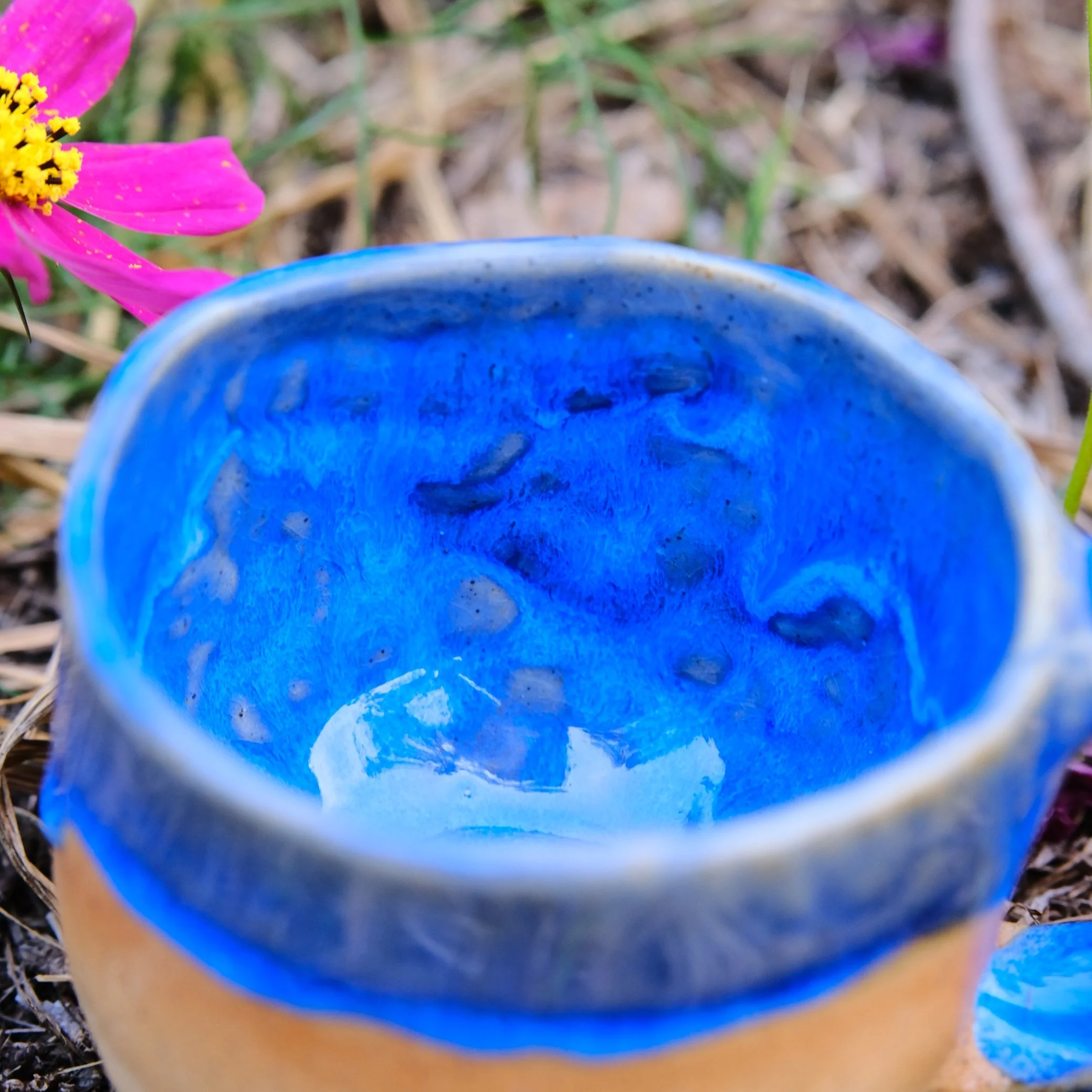 unique bee themed pottery mug with blue glaze handmade ceramic australia