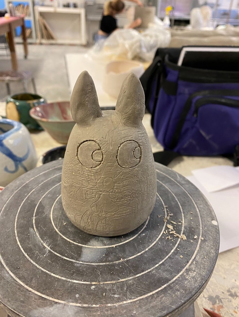 Now for a few that sadly didn't make it out of the greenware stage but I still think about all the time. This is a mini totaro from My Neighbor Totaro with engravings on it mapping where I would've glazed in a similar style to pieces shown previously