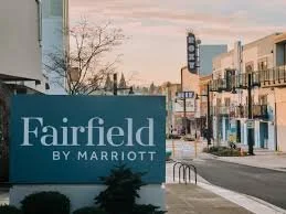 Fairfield by Marriott hotel sign on a city street