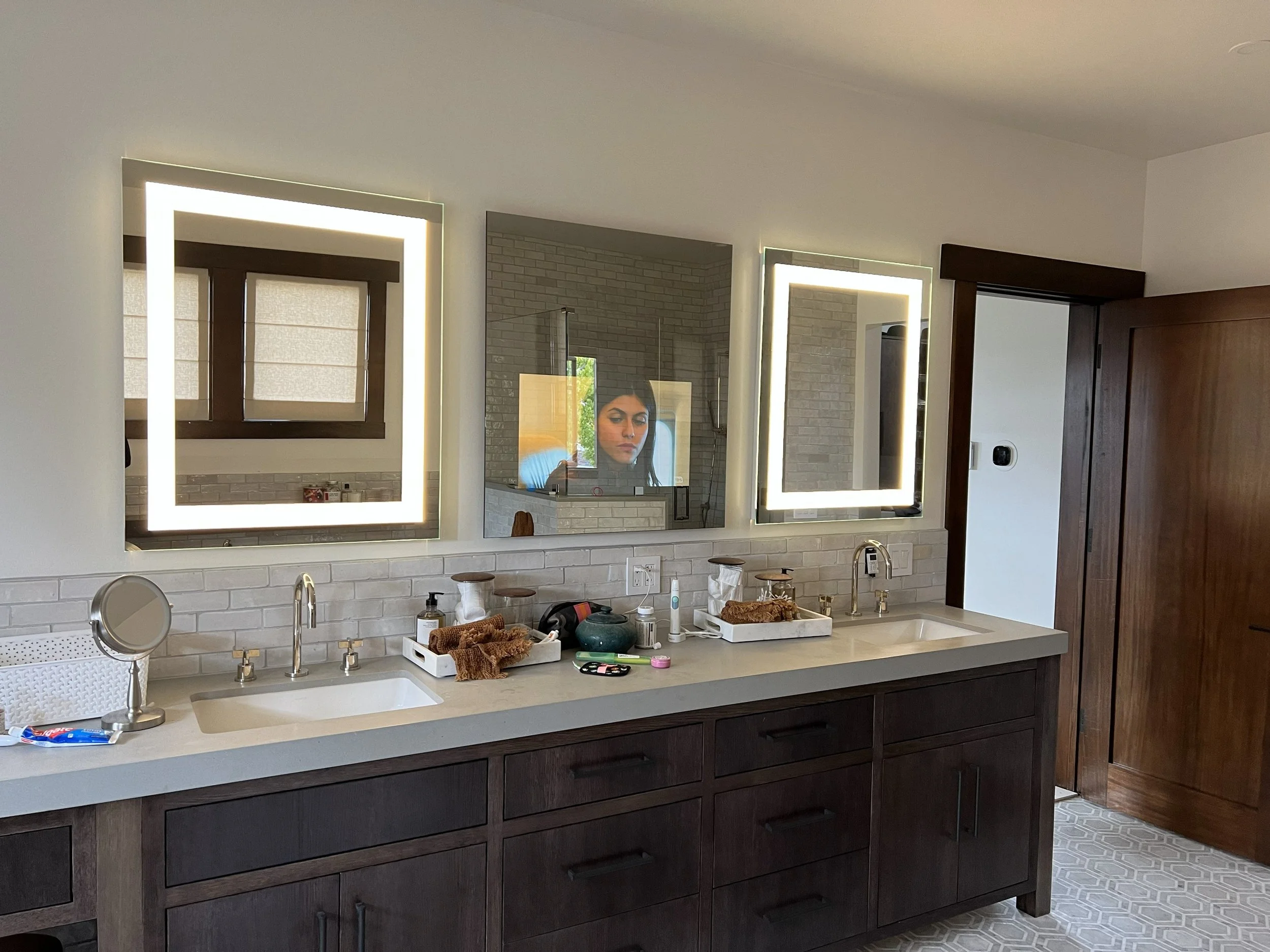 A modern bathroom with TV mirror installation