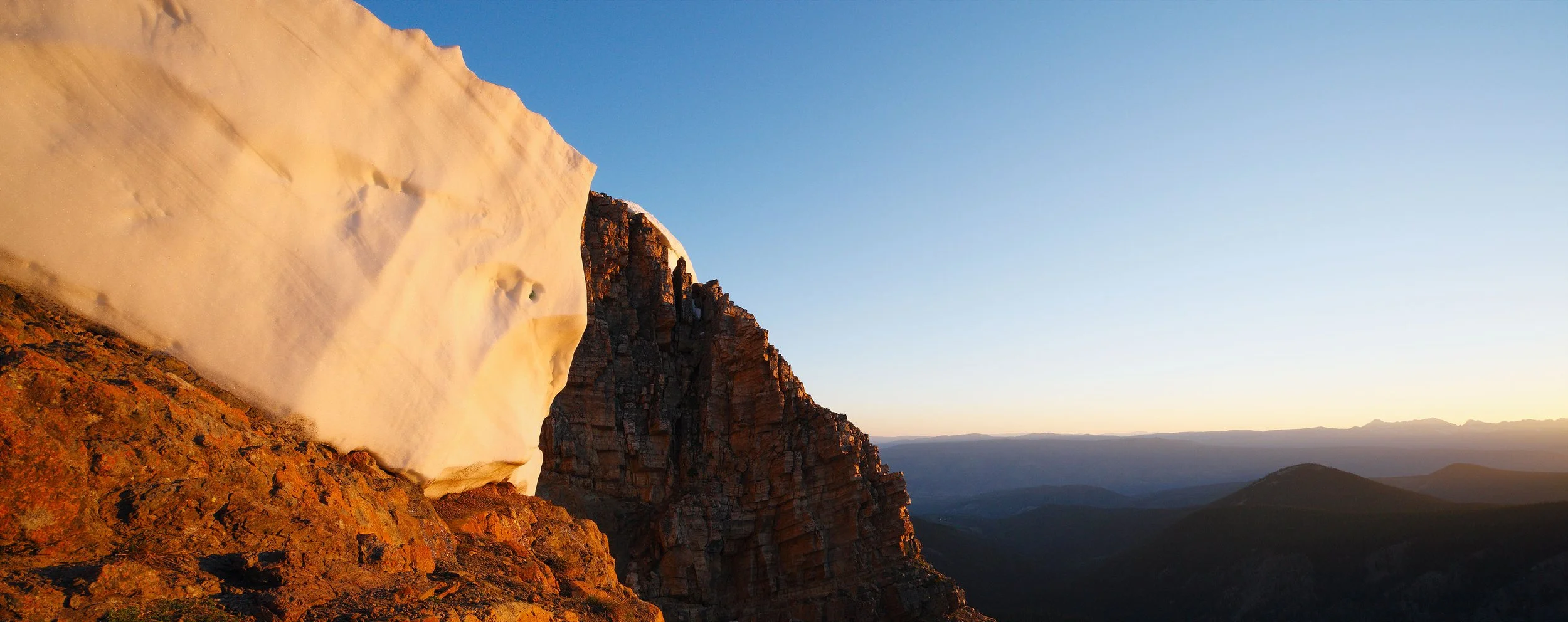 FIRST LIGHT ON MELTING CORNICE, NEW YORK MOUNTAIN