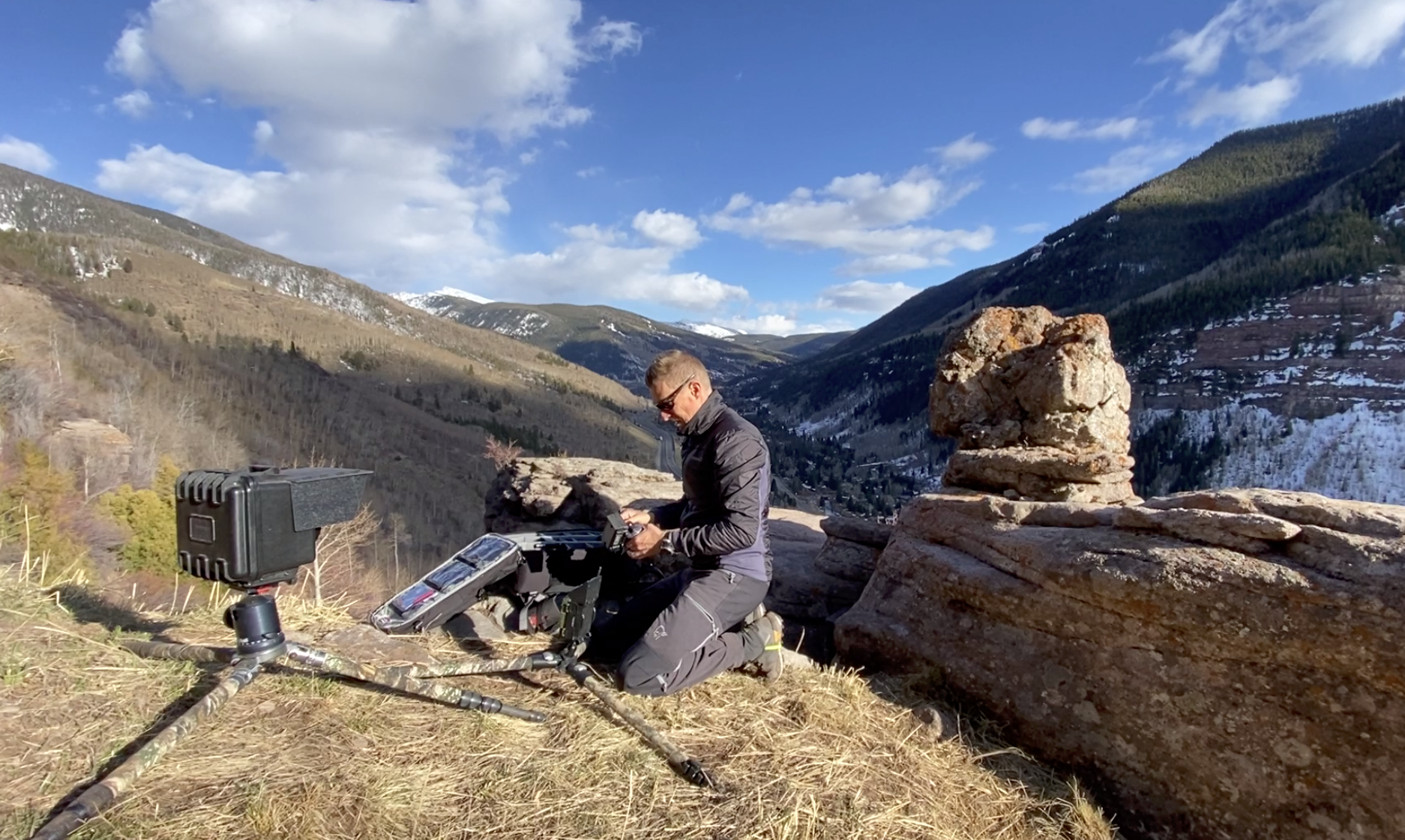 Setting up a camera trap system above East Vail 