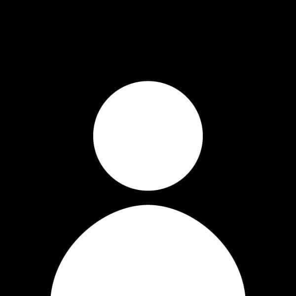 Silhouette of a person with a circular head and a rounded body, in black and white.