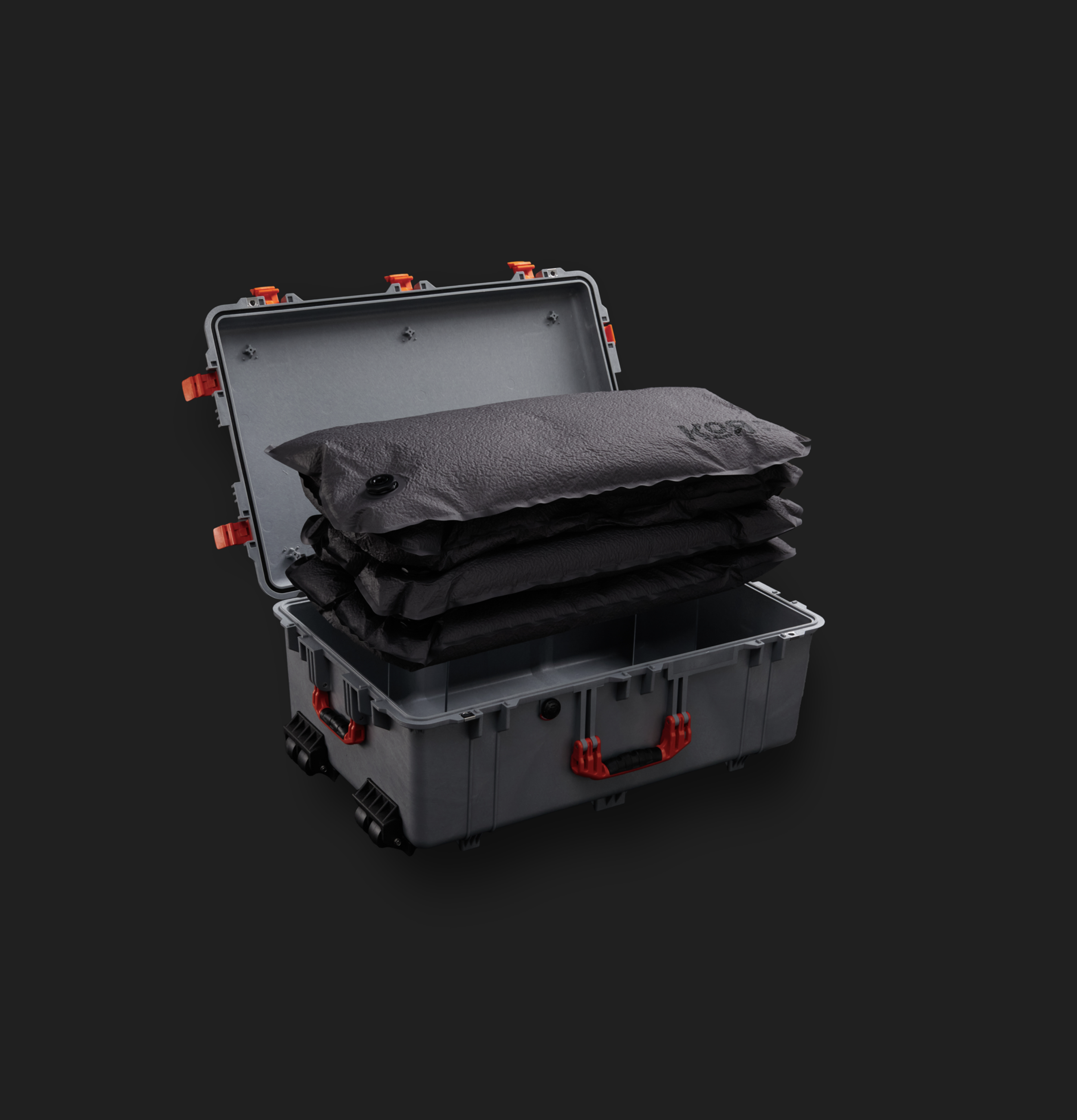 Multiple KOR Vacuum Rigidizing Structure (VRS) panels stacked inside a rugged transport case, demonstrating the modular layering system.