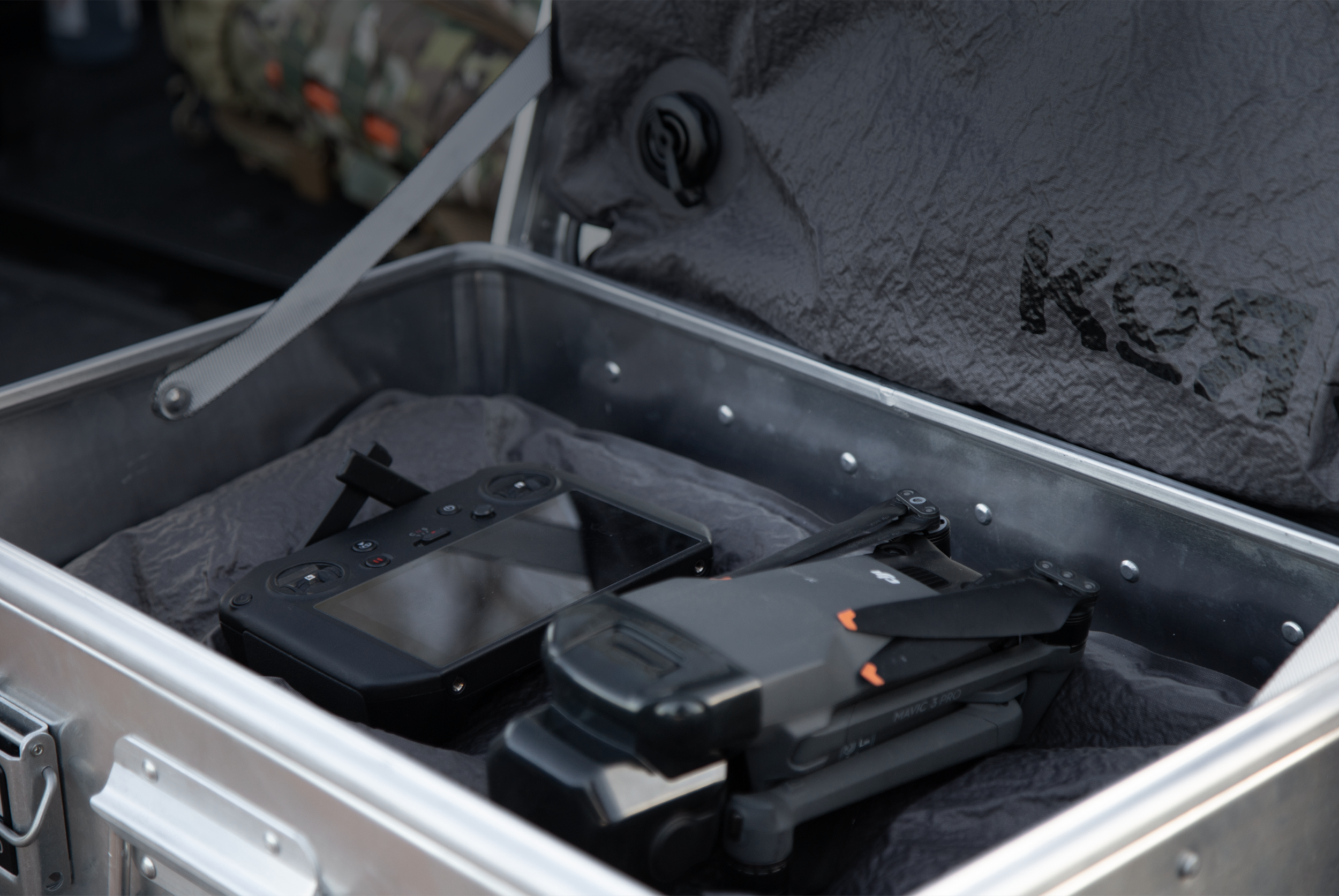 Drone and controller securely protected inside a KOR Vacuum Rigidizing Structure (VRS) panel within a rugged transport case.