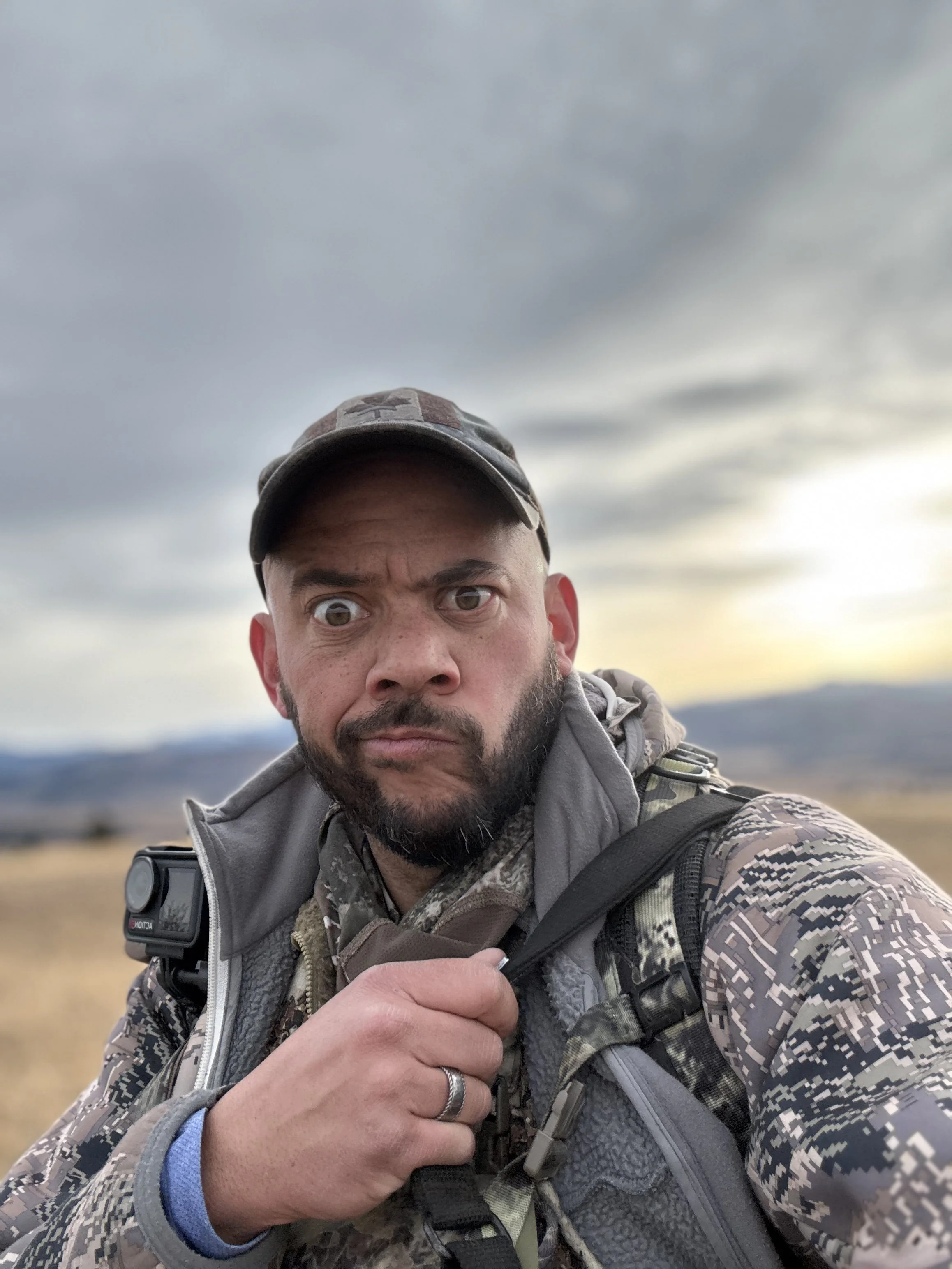 Rustic Roots Outdoors creator in the Alberta mountains during a Canadian hunting and outdoor adventure.