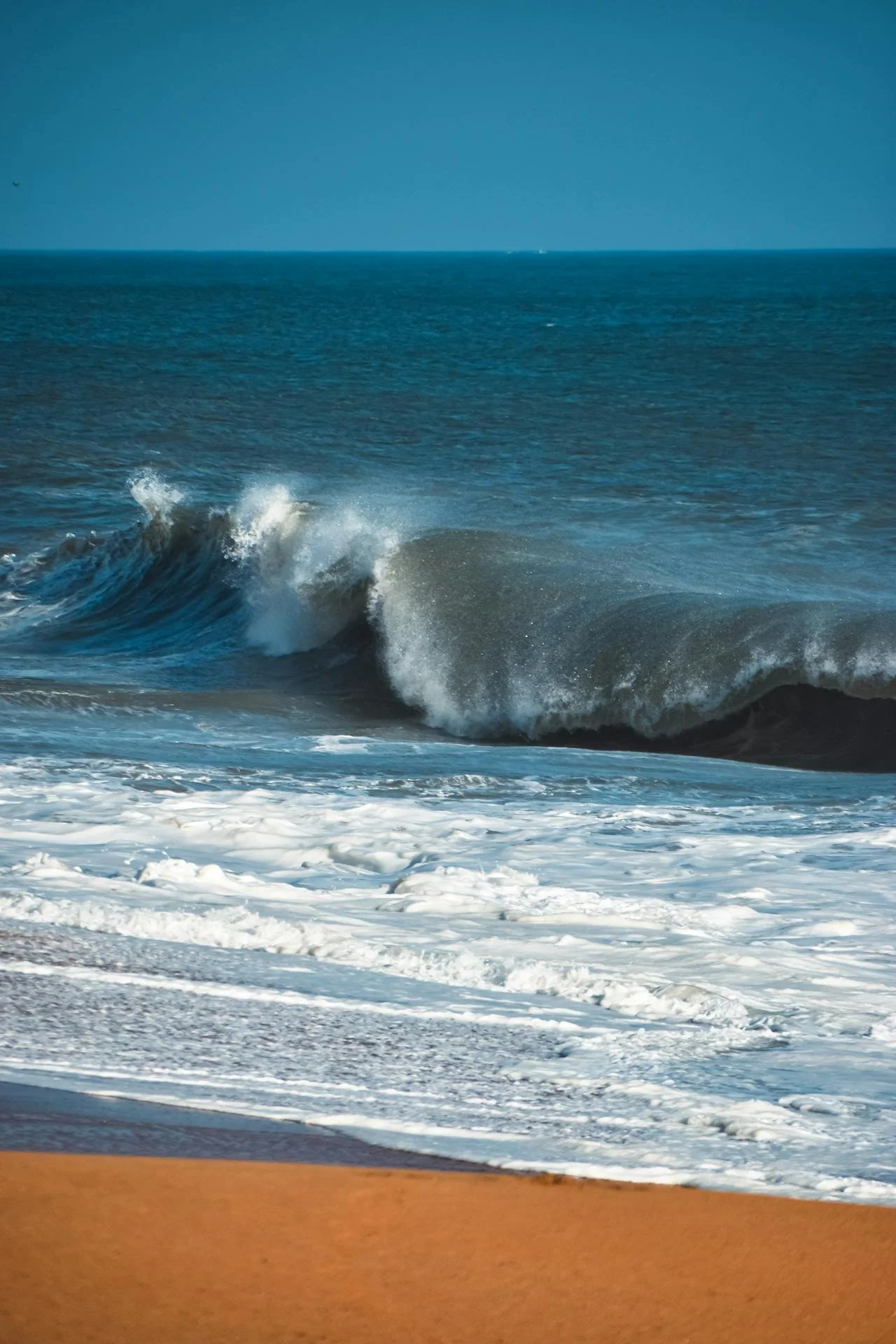 wave crashing on a beach