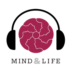 A logo featuring a brain inside a pair of headphones with the text 'MIND & LIFE' beneath.