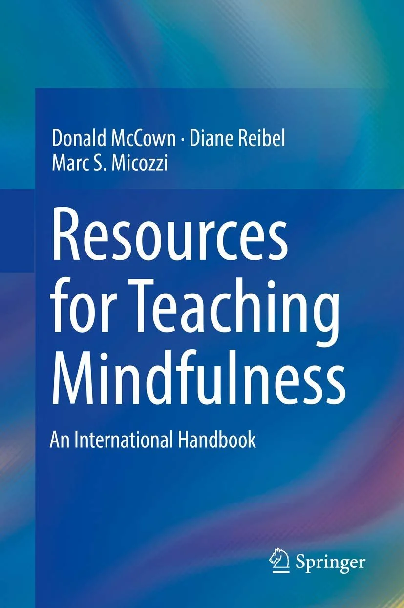 Book cover titled "Resources for Teaching Mindfulness: An International Handbook" by Donald McCown, Diane Reibel, and Marc S. Micozzi, published by Springer.