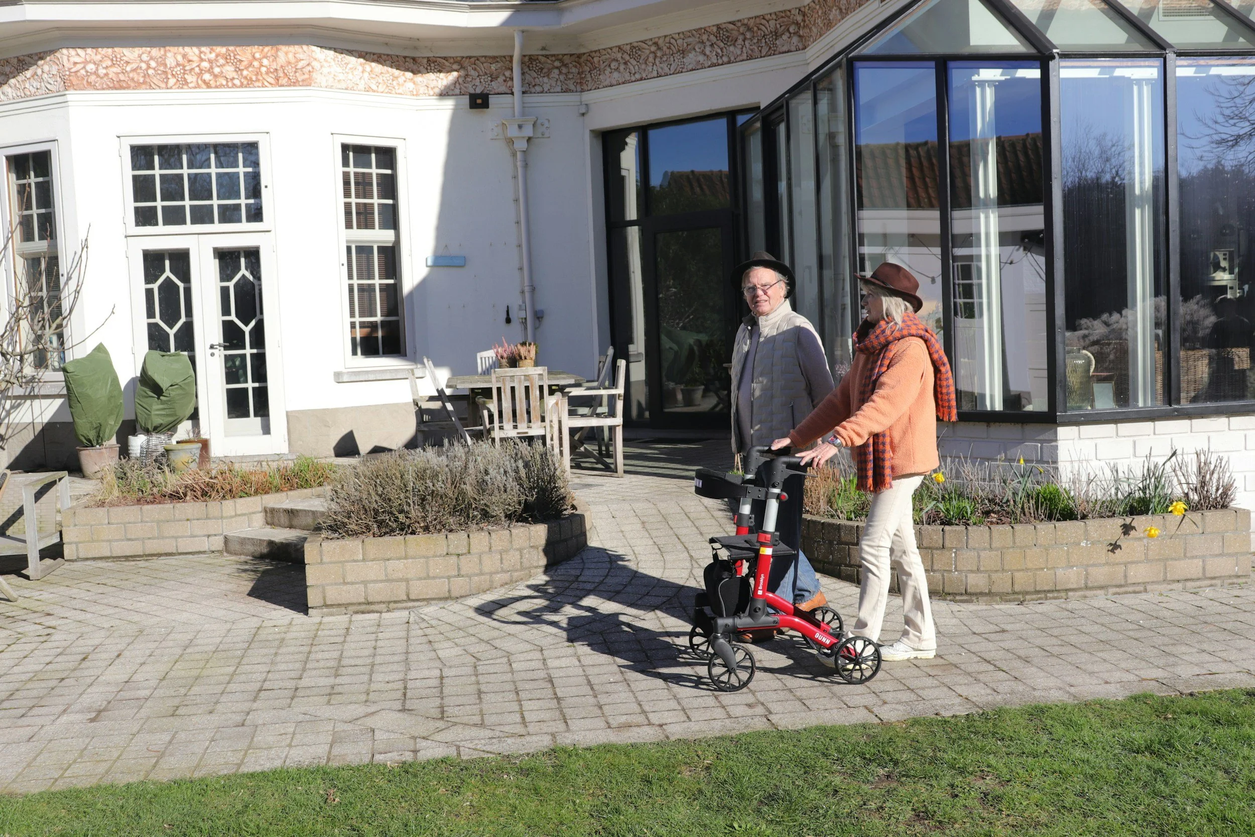 Seniors utilizing accessible pathways near retirement housing options and independent living resources in Vernon, BC.