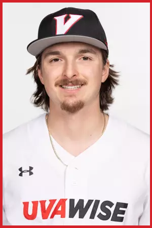 Young man wearing a black baseball cap with a white 'V' logo, white sports jersey with 'UVA WISE' logo, and a gold chain, smiling at the camera.